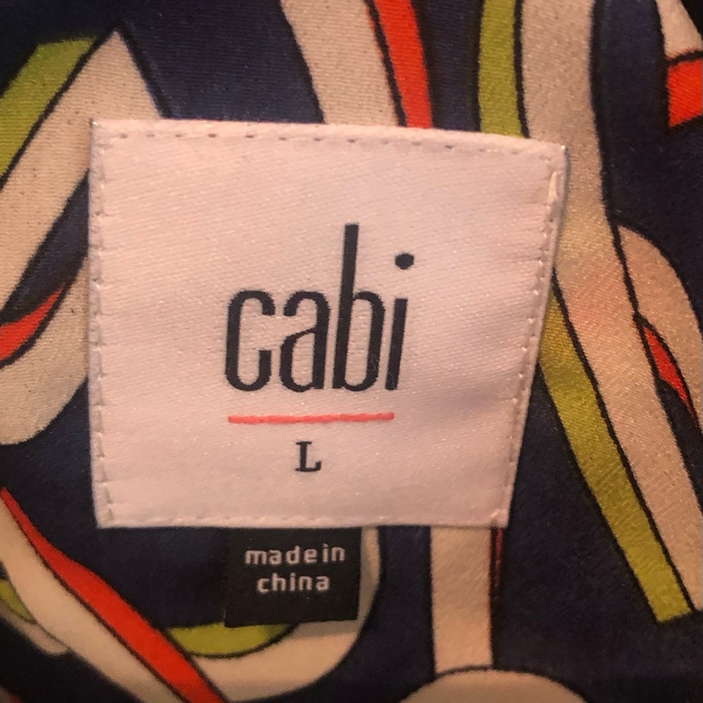 Cabi - Sleeveless & very lightweight. Dress is perfect for hot summer days!